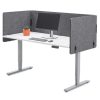 Dark grey desk screens fitted around a white height-adjustable office desk