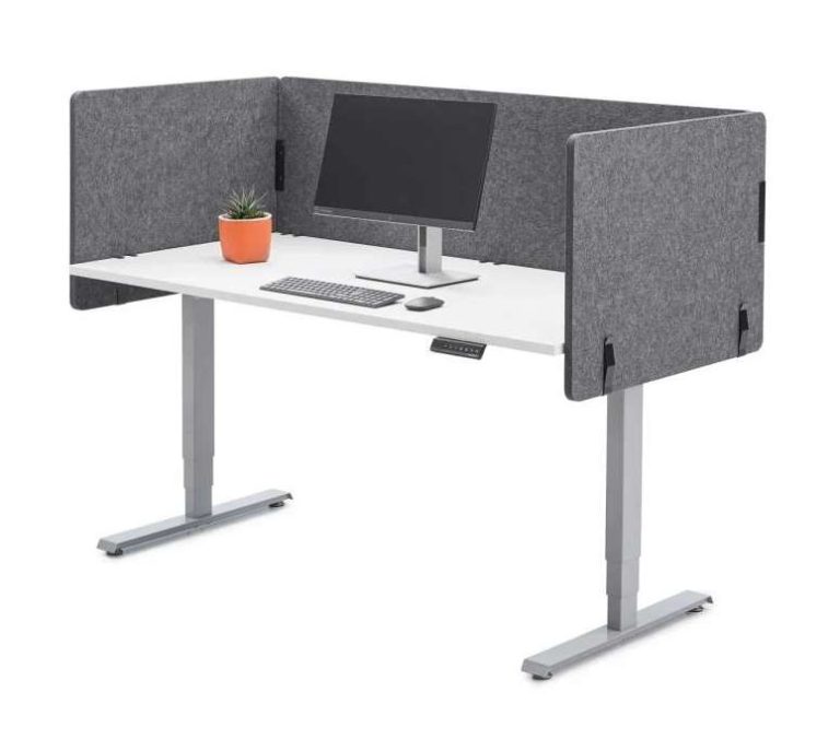 Dark grey desk screens fitted around a white height-adjustable office desk