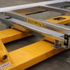 Floor-mounted pallet pull-out unit with floor riser for pallet racking, 800 kg