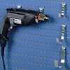 R29 perforated panel tool hook holding an electric drill