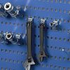 R30 perforated panel socket holder hooks holding sockets on a blue tool panel