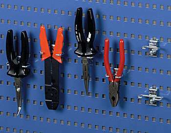 R35 pliers holders with pliers and side cutters on a blue perforated tool panel