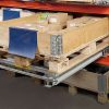 Single-sided pallet pull-out unit installed in pallet racking (70% extension)