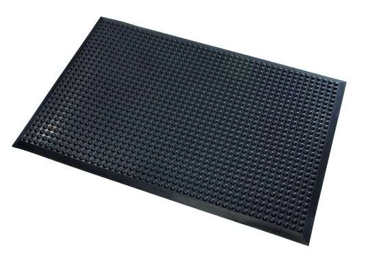 Black Treston Ergo ESD floor mat with a raised dot pattern, 950 x 650 mm