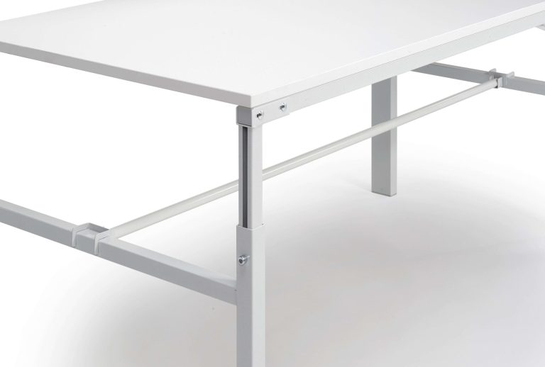 Treston lower paper roll holder mounted on the horizontal tubes beneath a workbench