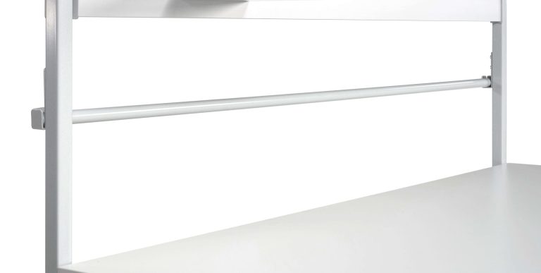 Treston upper paper roll holder mounted between bench uprights above the worktop